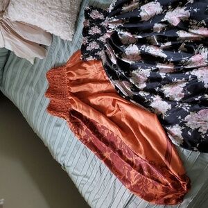 2 pairs of silky fabric genie pants.